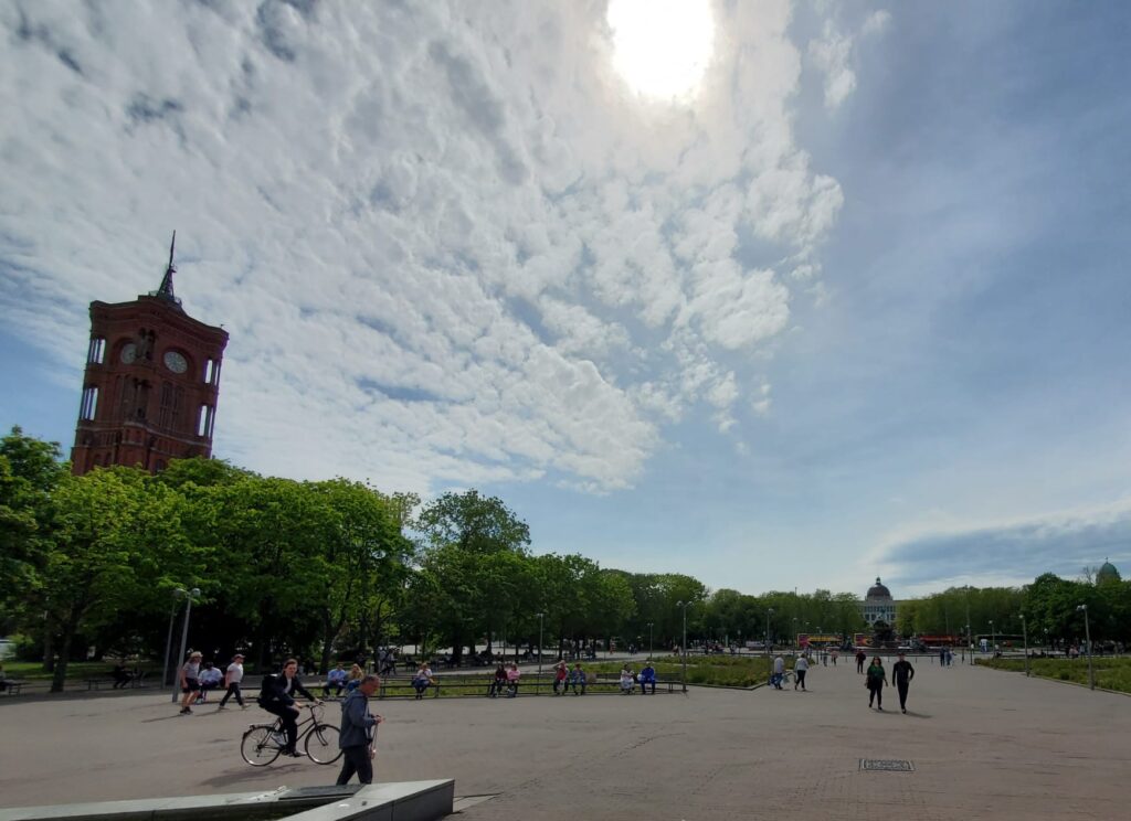 A wide angle view showing the Rotes Rathaus to the left and, in the distance, the dome over the palace.