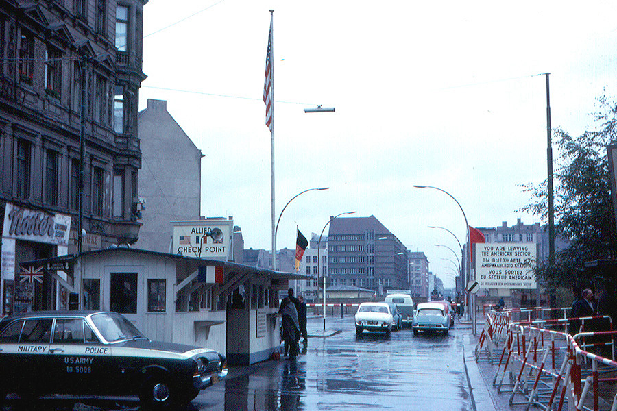 Checkpoint Charlie in 1963, "You are leaving the American Sector"